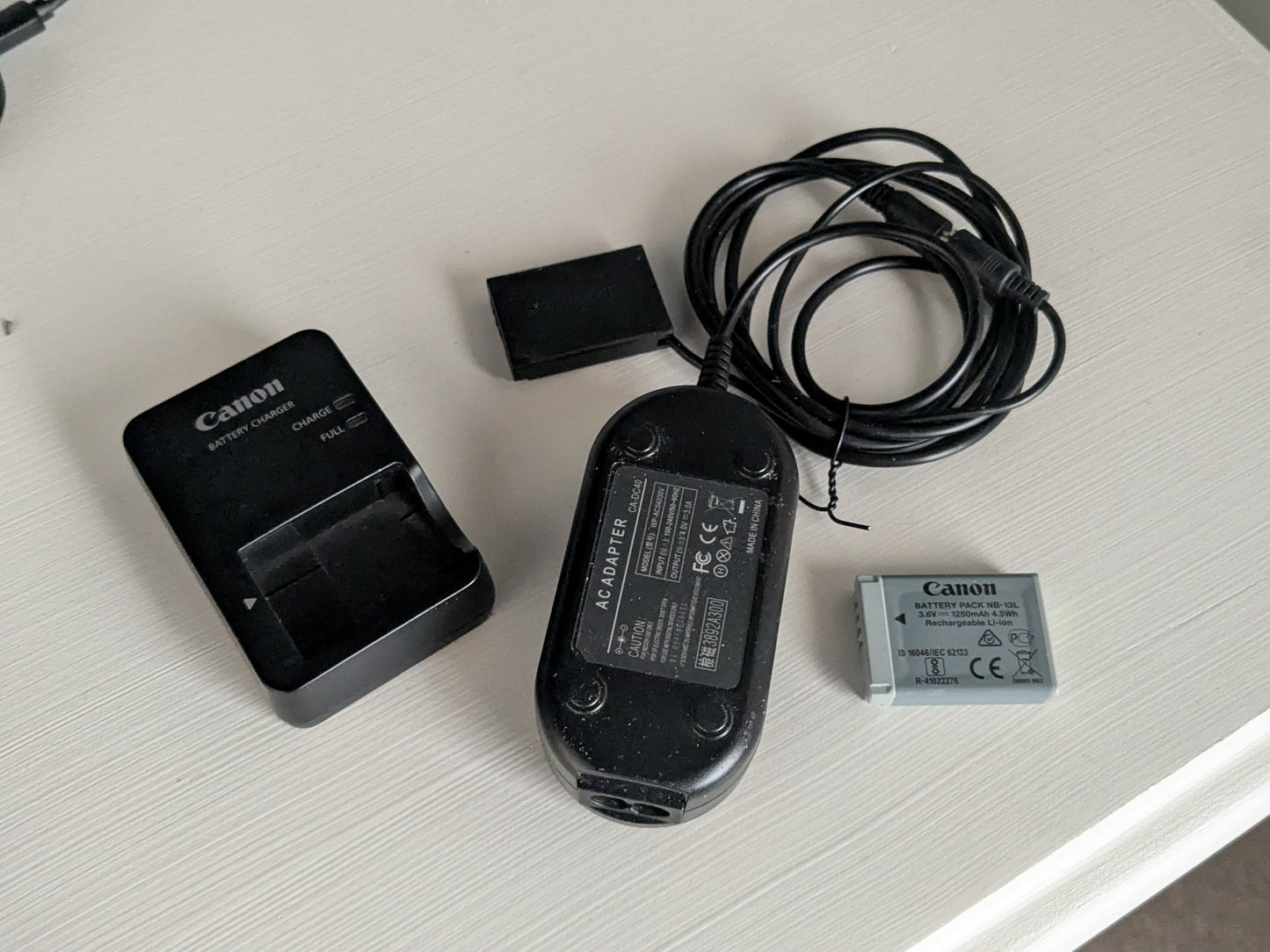 Used Canon NB-13L Battery, charger, and dummy battery